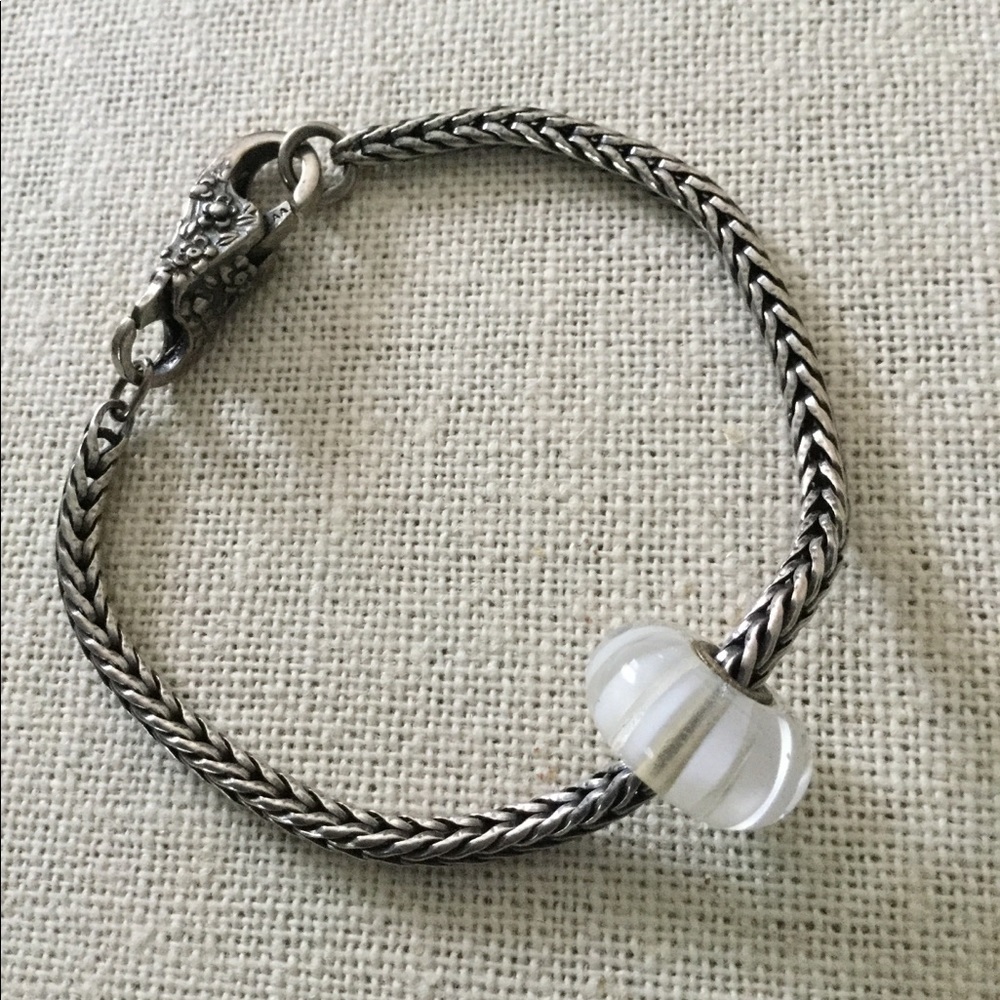 Trollbeads sterling bracelet with charm.